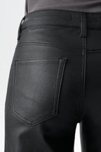 Edgy Coated Mid Rise Wide Leg Jeans