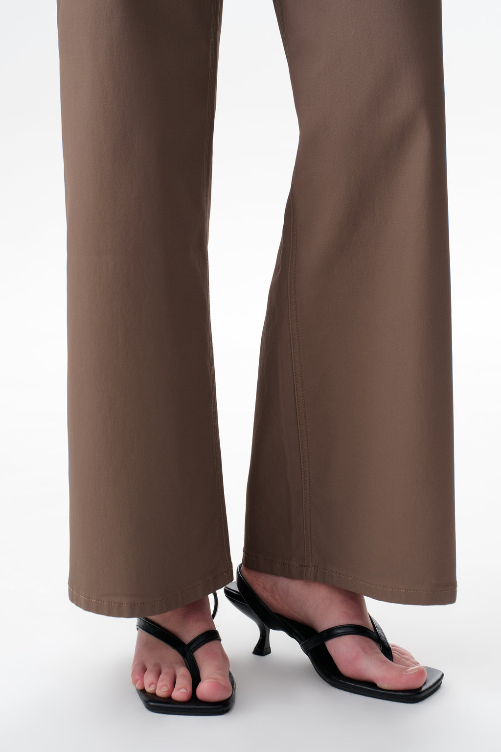 Edgy Coated Mid Rise Wide Leg Jeans