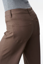 Edgy Coated Mid Rise Wide Leg Jeans